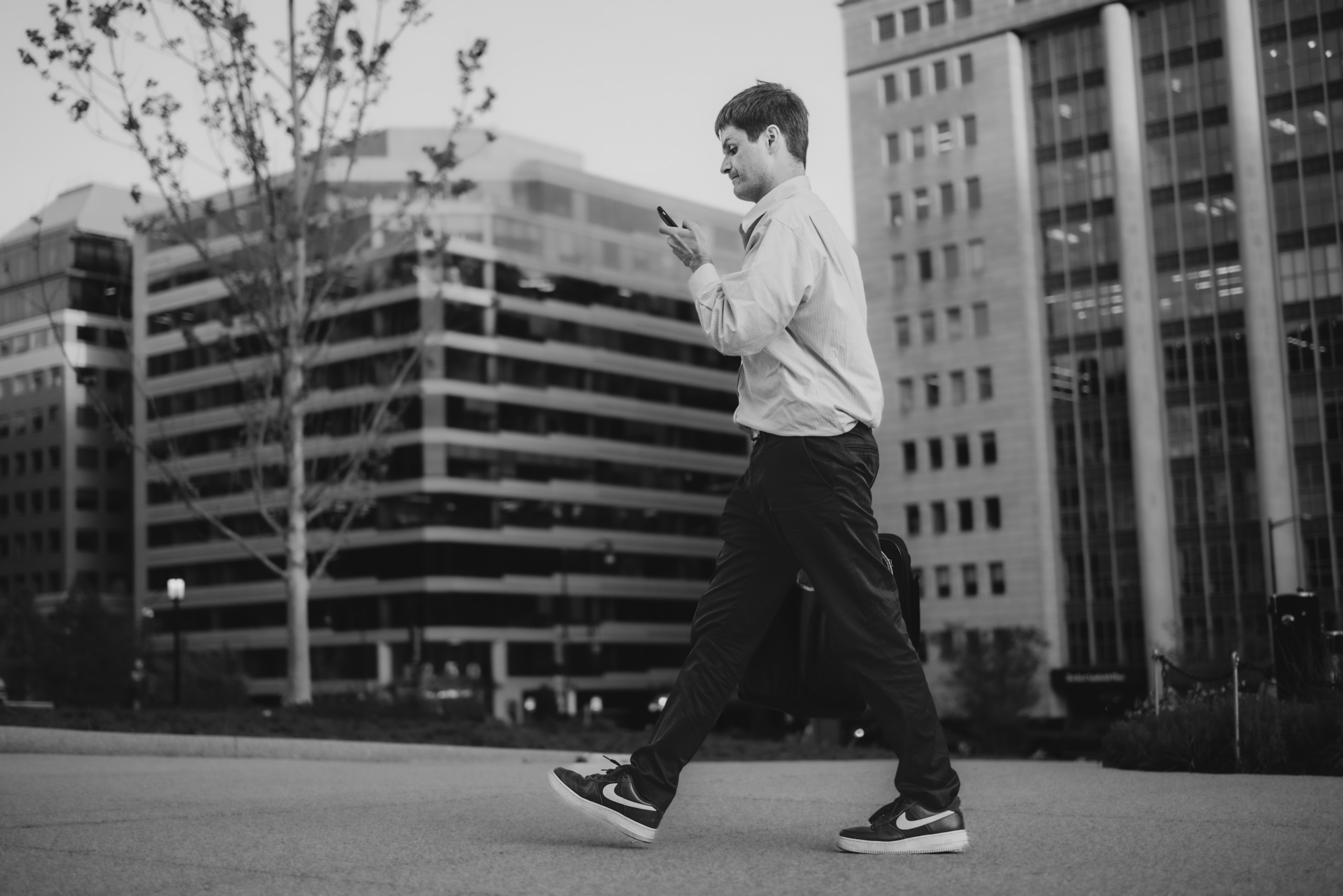 Checking His Phone on the Go